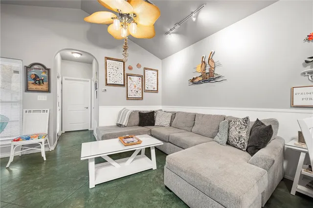 a living room with furniture and a couch