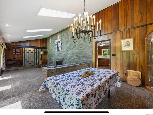 a view of an empty room with a large window