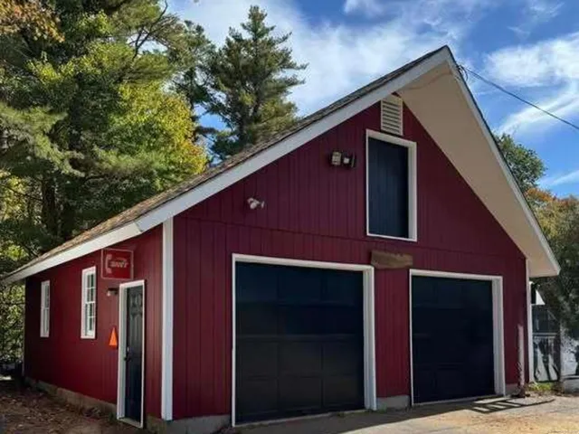 a view of a house with a tree