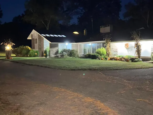 a view of a lake with a big yard