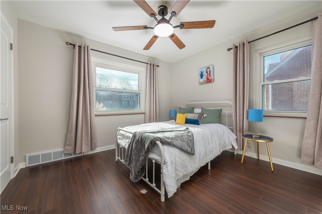 10514 Snow Road Parma, OH 44130 - Photo 21 of 50 Main Floor Bedroom w/ceiling fan, Vinyl Plank Flooring, 2 Windows