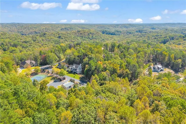 a view of a pathway both side of yard