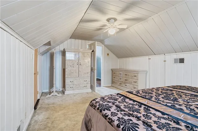 wooden floor in a hall with a window