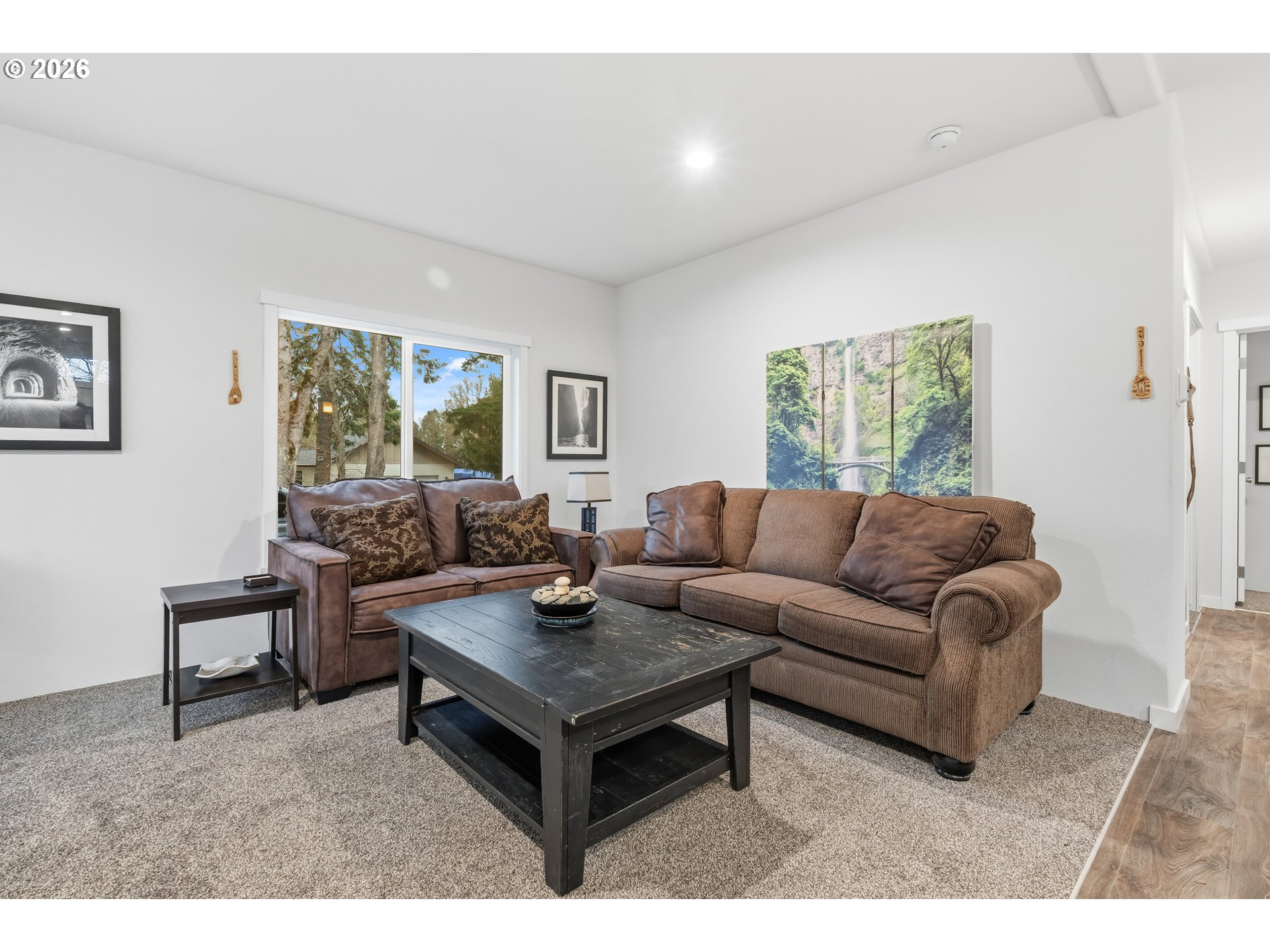 1390 Rockford Road Hood River, OR 97031 - Photo 4 of 14 a living room with furniture and a painting on the wall