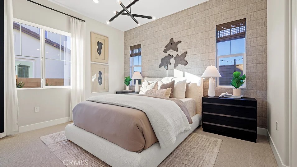 1355 Gavilan Ridge Rancho Mission Viejo, CA 92694 - Photo 13 of 26 a bedroom with a bed and painting on the wall