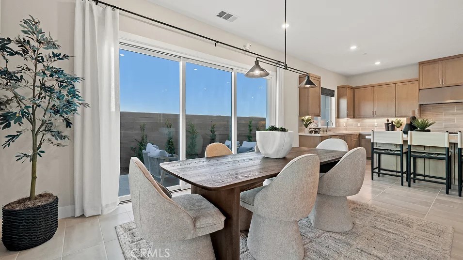 1355 Gavilan Ridge Rancho Mission Viejo, CA 92694 - Photo 3 of 26 a view of a dining room with furniture