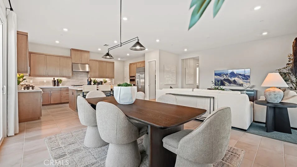 1355 Gavilan Ridge Rancho Mission Viejo, CA 92694 - Photo 4 of 26 a view of a dining room with furniture