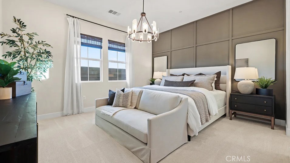 1355 Gavilan Ridge Rancho Mission Viejo, CA 92694 - Photo 9 of 26 a bedroom with bed and a chandelier