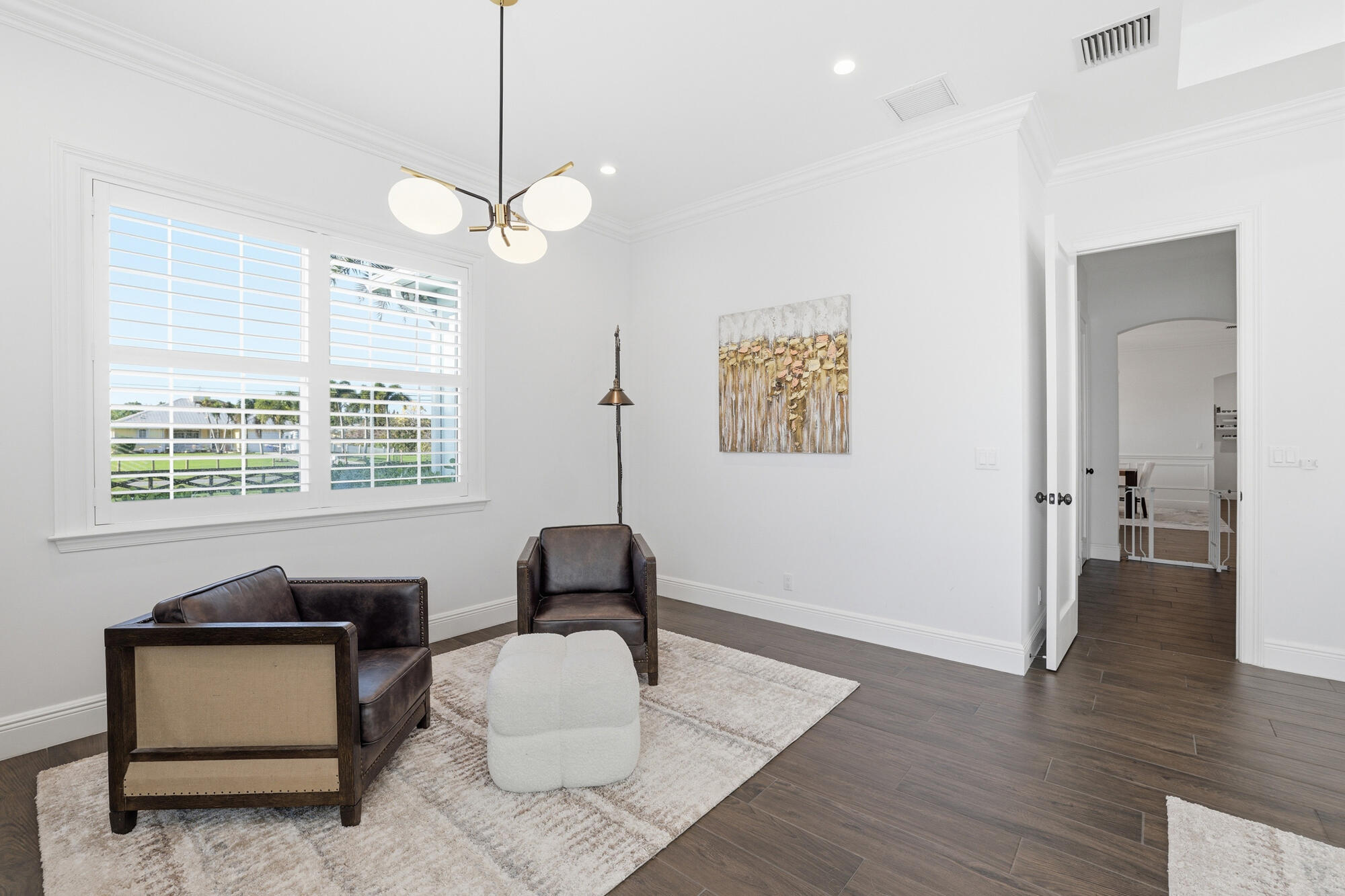 9301 154th Road North Jupiter, FL 33478 - Photo 16 of 41 MASTER BEDROOM SEATING