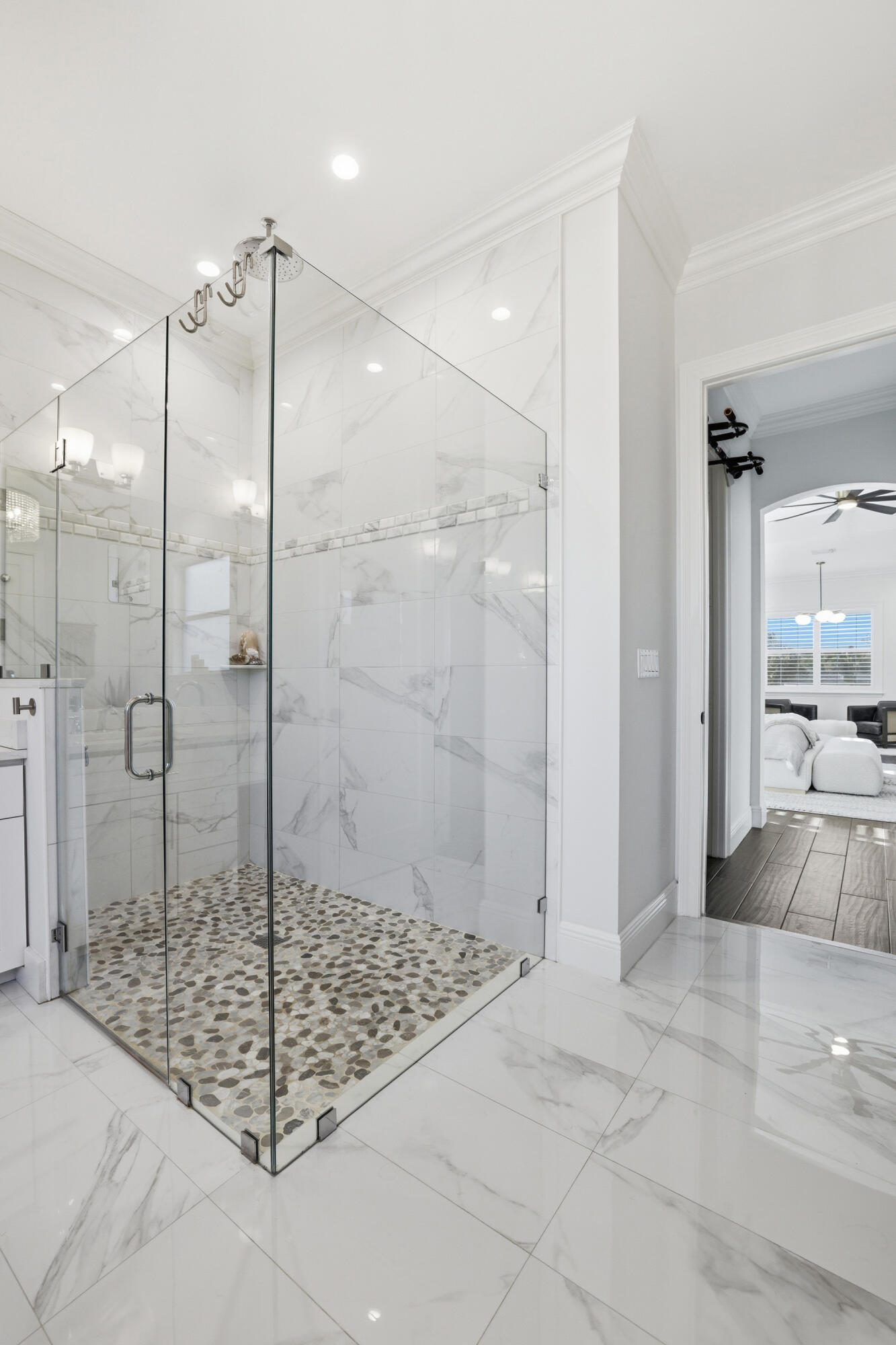 9301 154th Road North Jupiter, FL 33478 - Photo 19 of 39 a bathroom with a shower and a sink