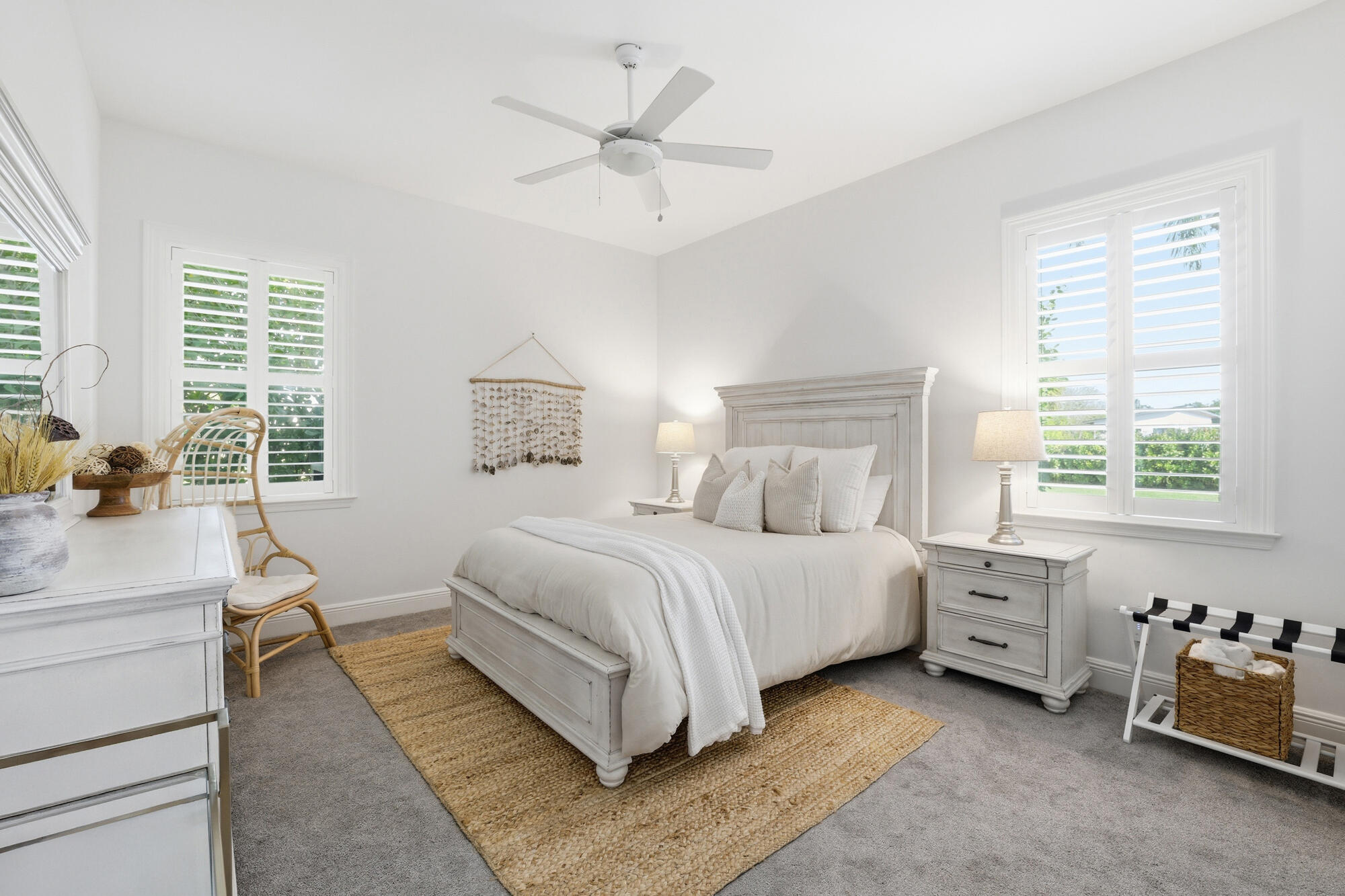 9301 154th Road North Jupiter, FL 33478 - Photo 20 of 39 a bedroom with a bed and a window