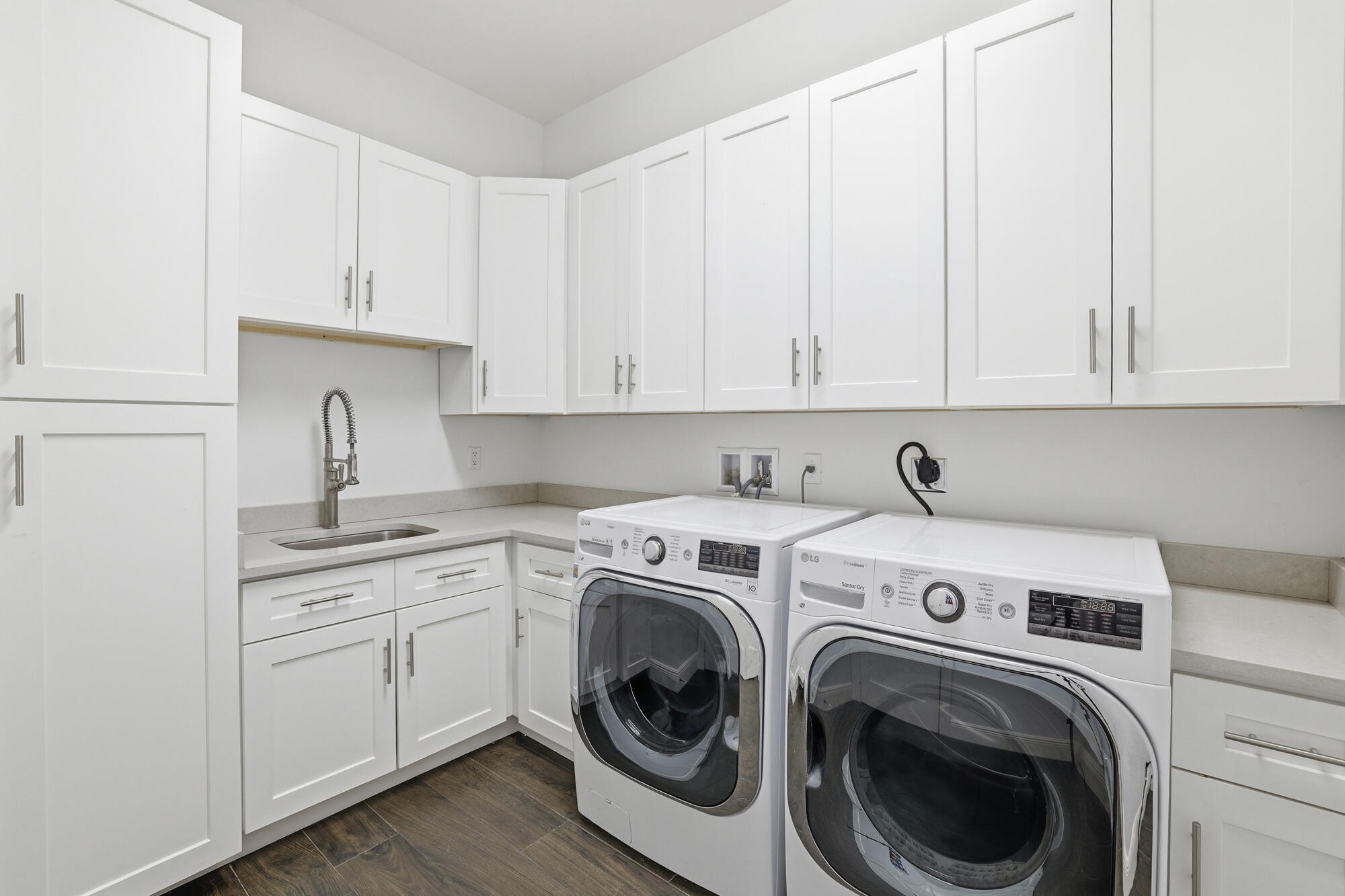 9301 154th Road North Jupiter, FL 33478 - Photo 24 of 39 a utility room with sink dryer and washer