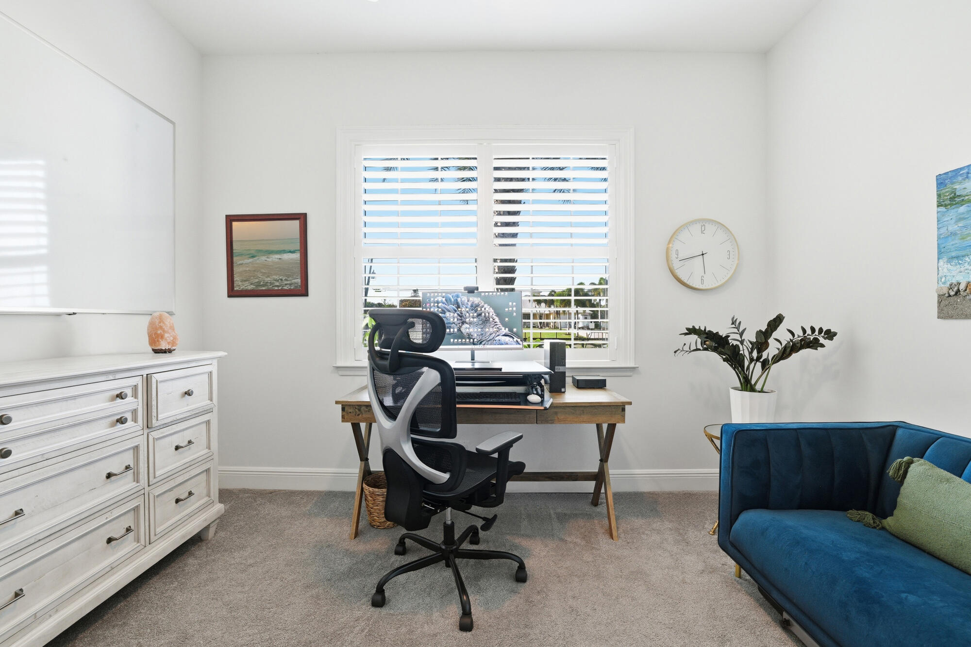 9301 154th Road North Jupiter, FL 33478 - Photo 25 of 39 a view of a workspace with furniture and a window