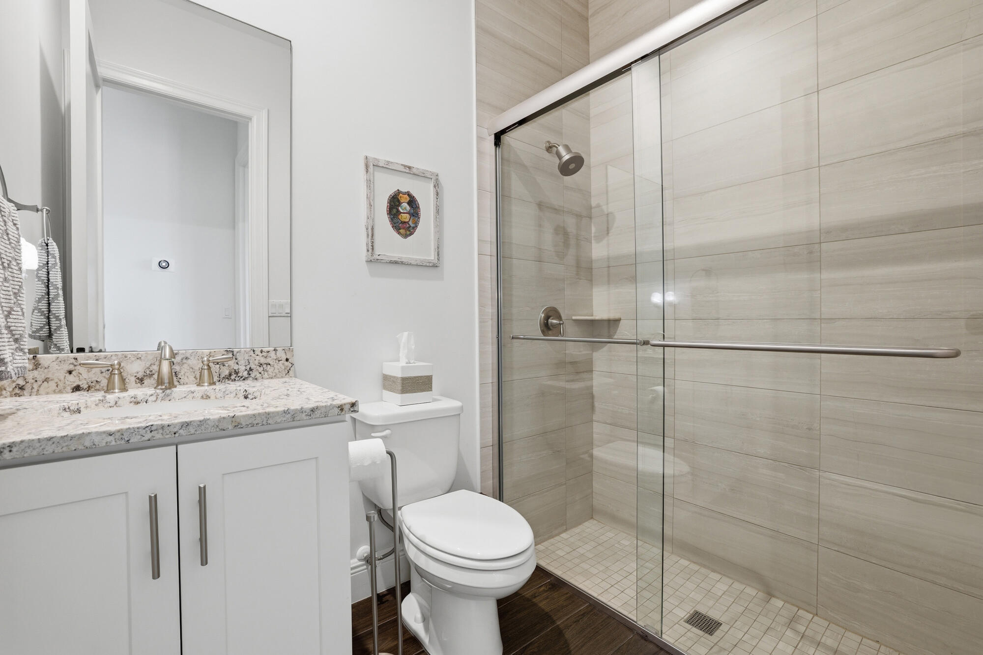 9301 154th Road North Jupiter, FL 33478 - Photo 26 of 39 a bathroom with a sink toilet and shower