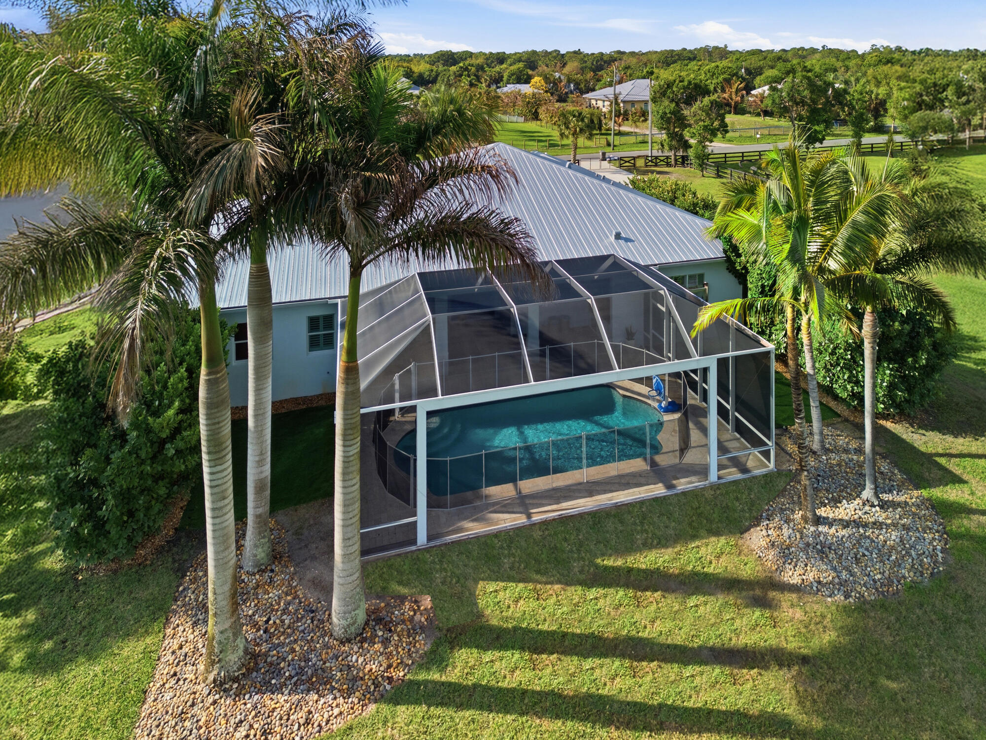 9301 154th Road North Jupiter, FL 33478 - Photo 32 of 39 a view of a house with a yard