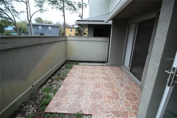 a view of entryway with a tree