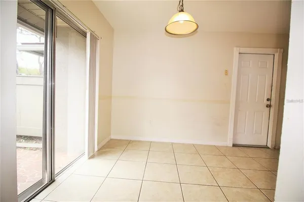 a view of a room with a window