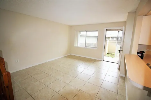 a view of a room with a window