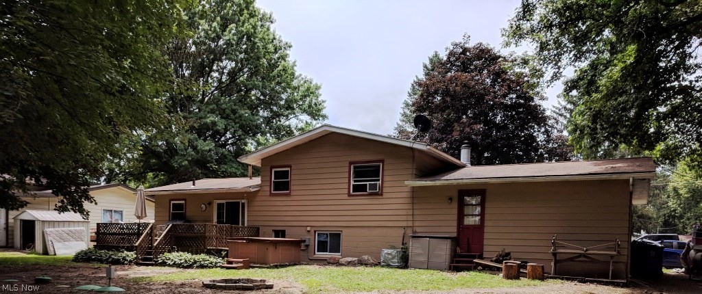 2935 Prior Road Akron, OH 44319 - Photo 24 of 29 The bag of the home has a man door that leads into the garage and the lower level entrance into the home.