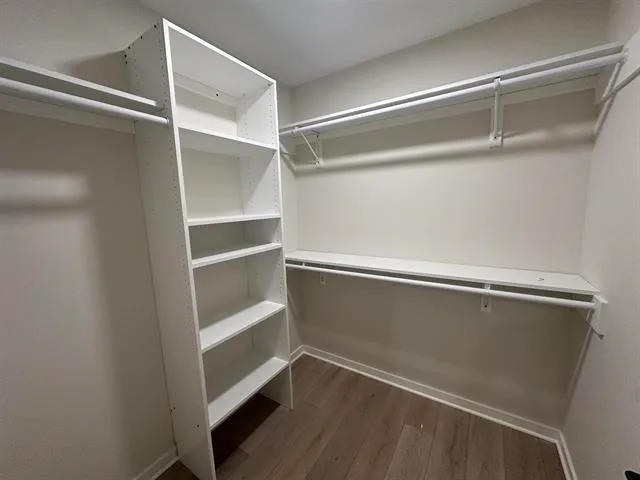 a view of an empty walk in closet