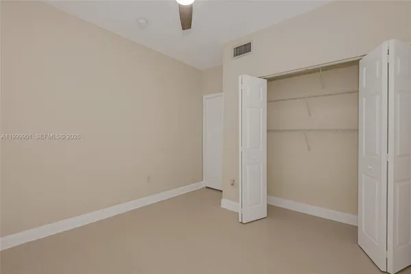 an empty room with closet