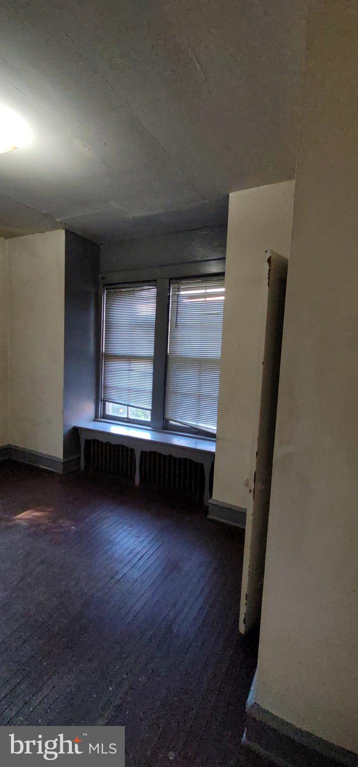 634 Centre Avenue, Unit 4 Reading, PA 19601 - Photo 11 of 20 a view of room with hardwood floor and window
