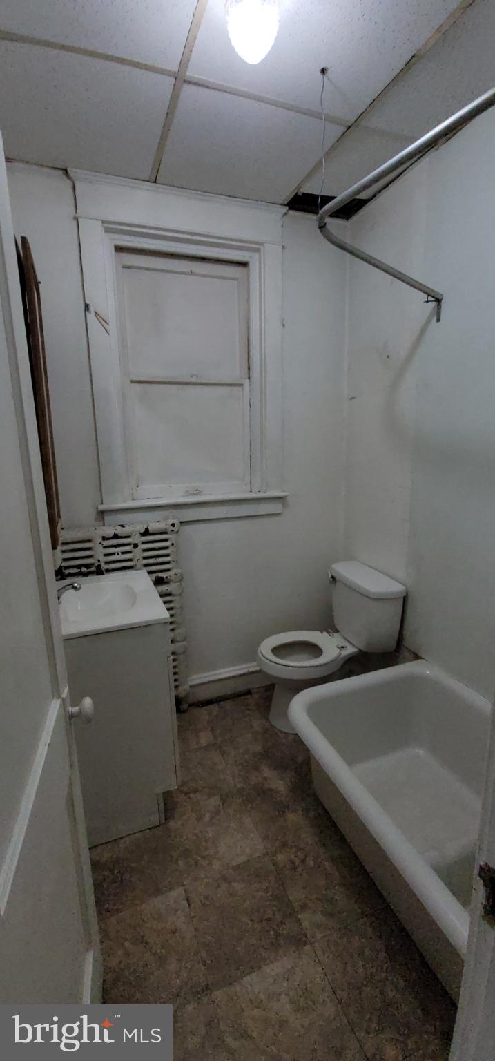 634 Centre Avenue, Unit 4 Reading, PA 19601 - Photo 18 of 20 a utility room with dryer and washer
