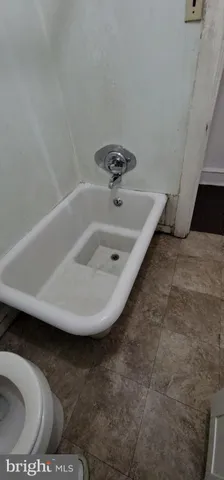 a view of a bathtub in bathroom