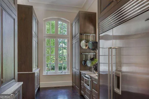 a kitchen with kitchen island granite countertop lots of counter top space