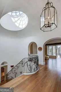 a view of a swimming pool with a yard