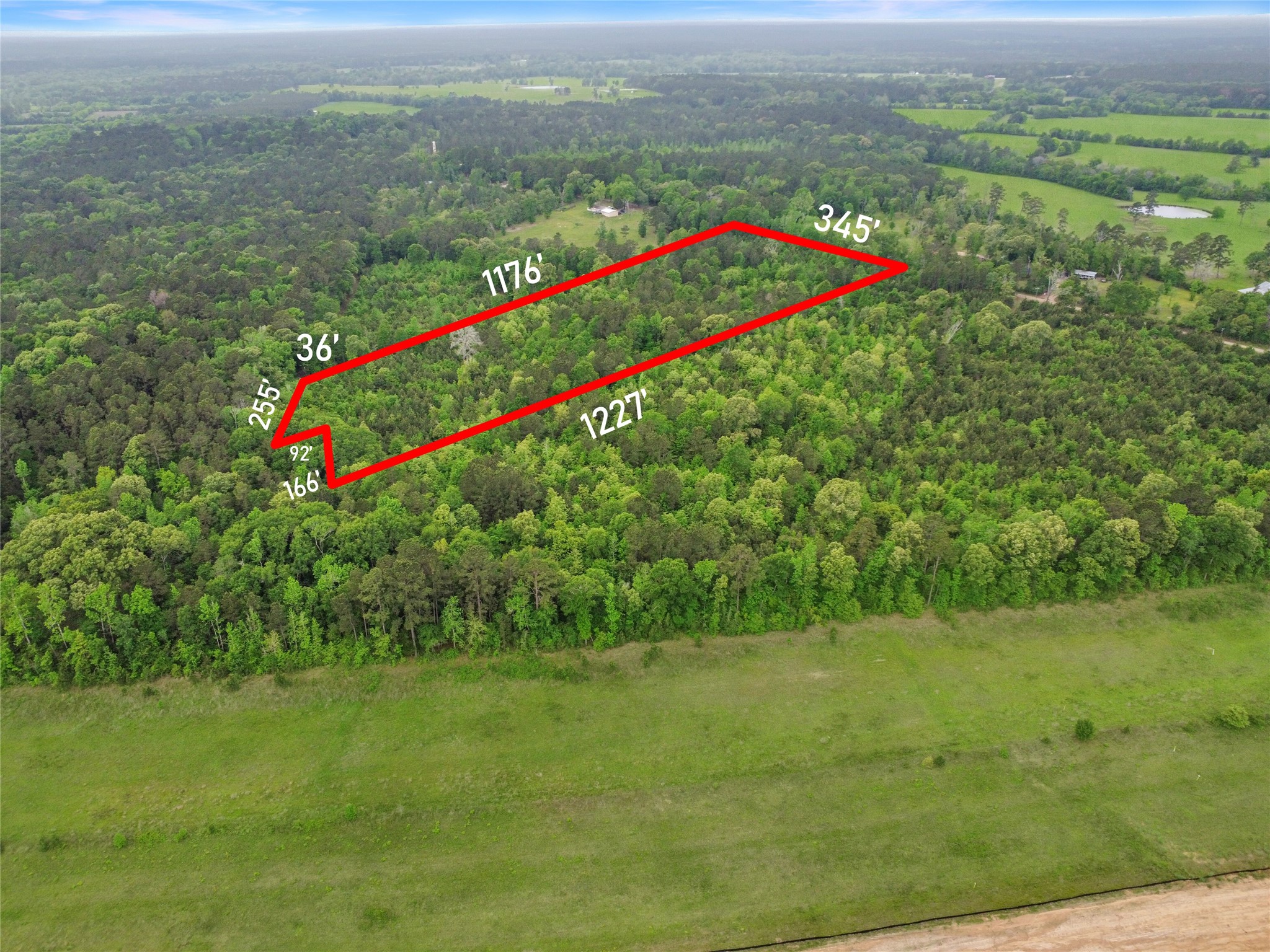 0 Raven Hill Road Oakhurst, TX 77359 - Photo 7 of 9 an aerial view of a houses with a yard