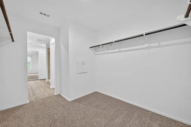 a view of yard with patio