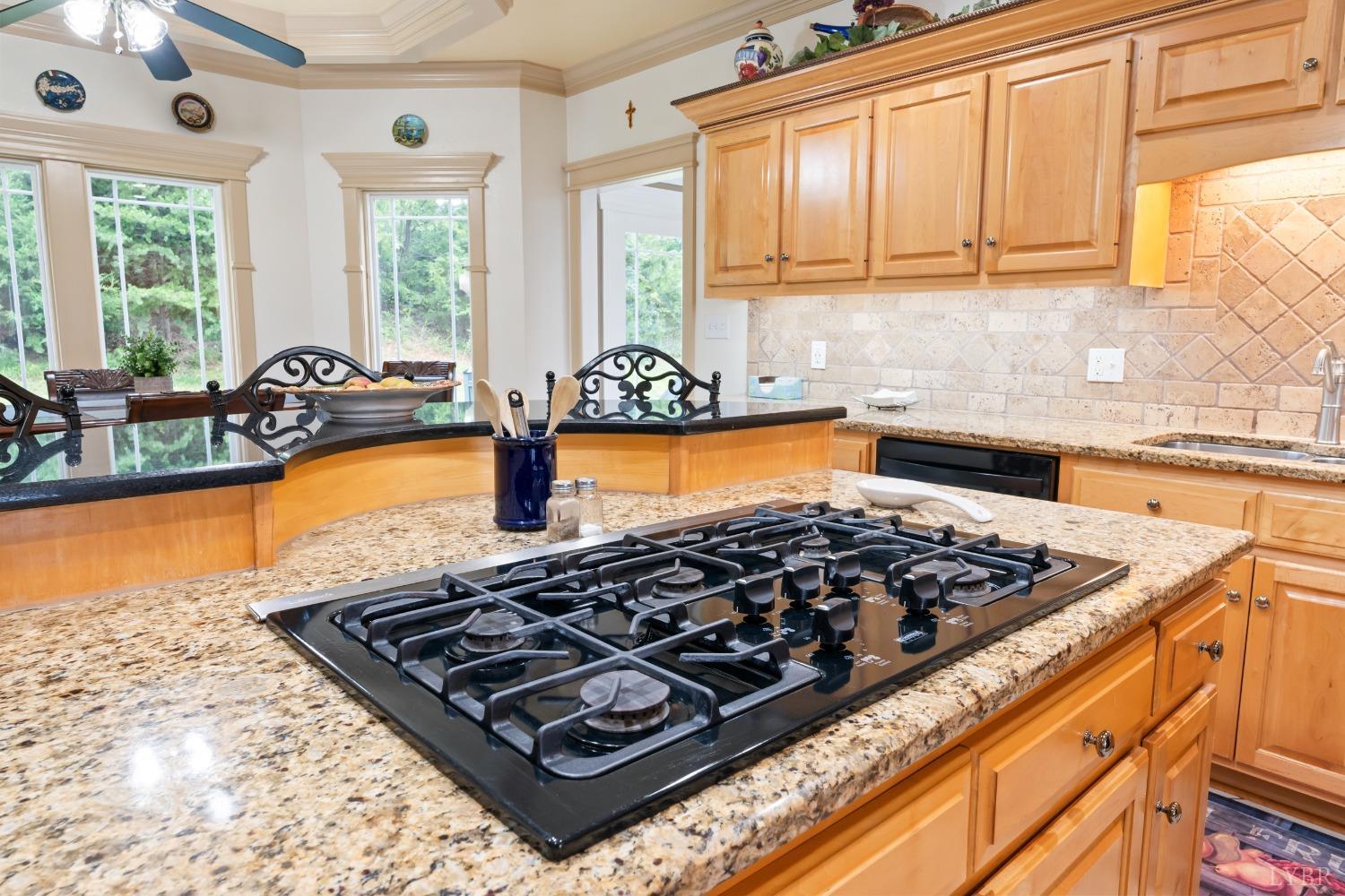 1136 Heavens View Drive Goode, VA 24556 - Photo 14 of 60 a kitchen with stove a sink and a window