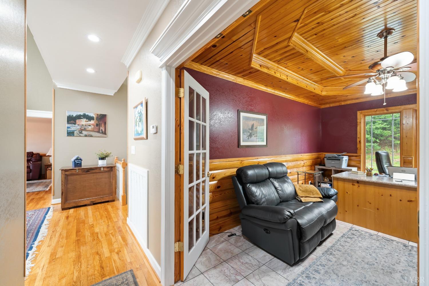1136 Heavens View Drive Goode, VA 24556 - Photo 24 of 60 a living room with furniture and a flat screen tv