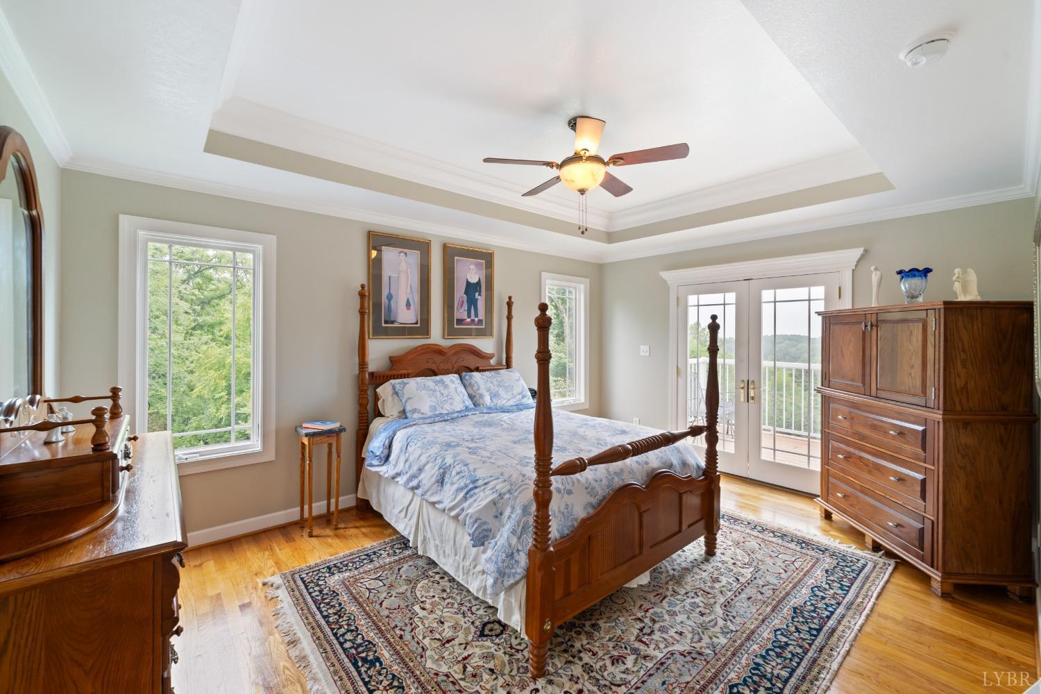 1136 Heavens View Drive Goode, VA 24556 - Photo 30 of 60 a bedroom with a bed and wooden floor