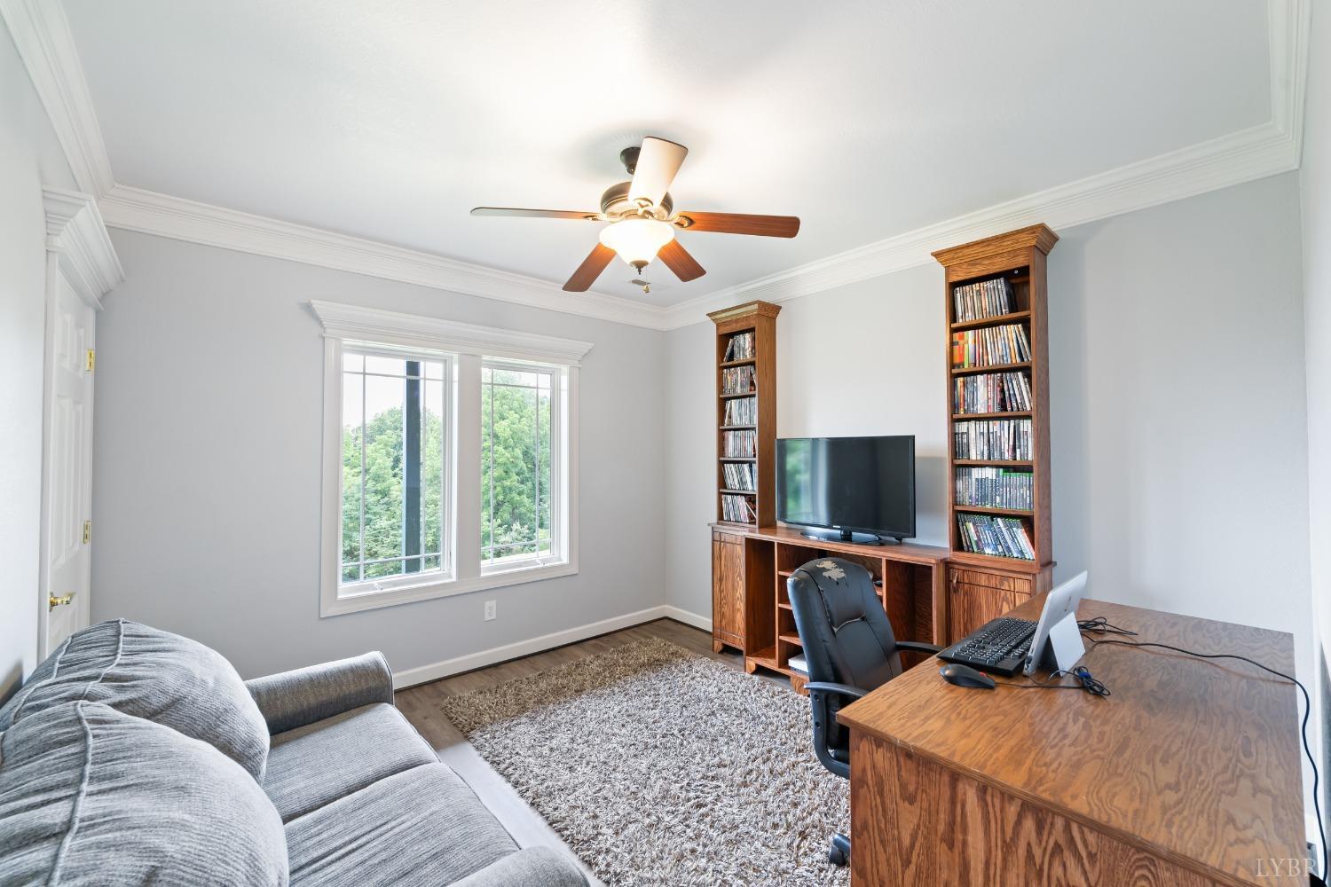 1136 Heavens View Drive Goode, VA 24556 - Photo 33 of 60 a bedroom with furniture and a window