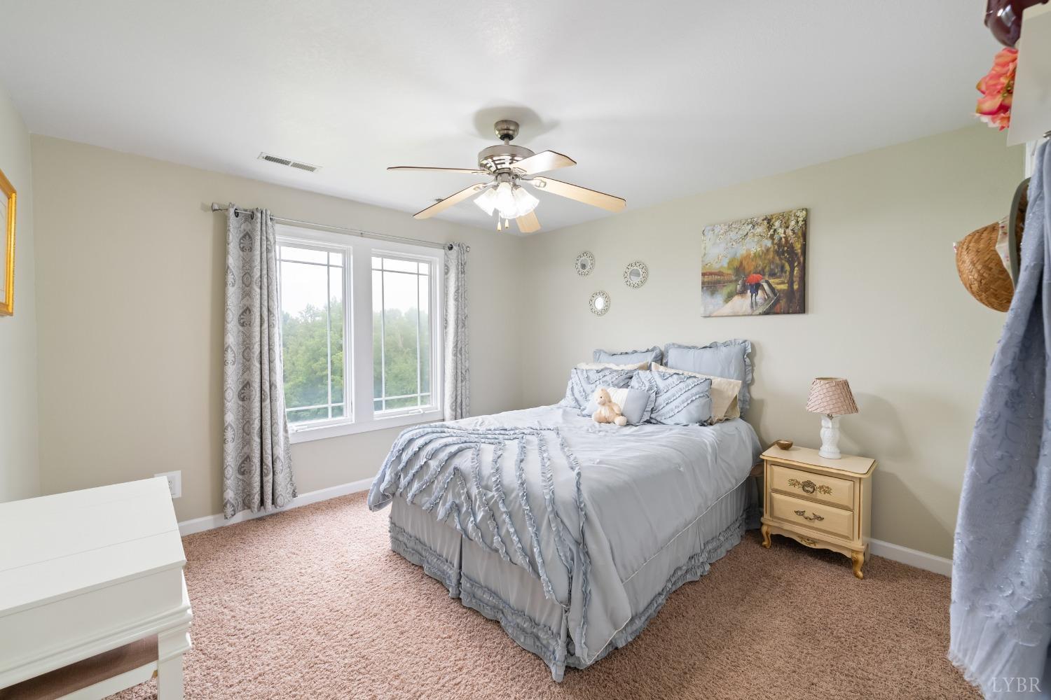 1136 Heavens View Drive Goode, VA 24556 - Photo 39 of 60 a bedroom with a bed and a window