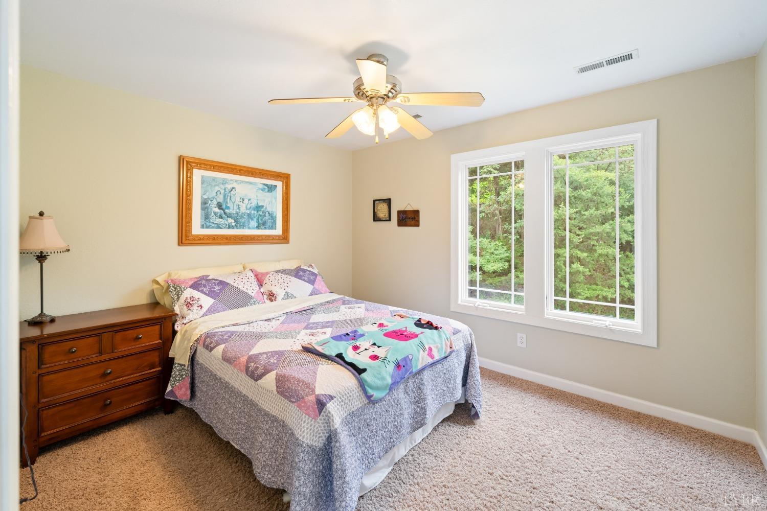 1136 Heavens View Drive Goode, VA 24556 - Photo 41 of 60 a bedroom with a bed and a window