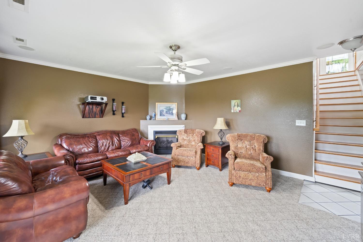 1136 Heavens View Drive Goode, VA 24556 - Photo 51 of 60 a living room with furniture and a chandelier