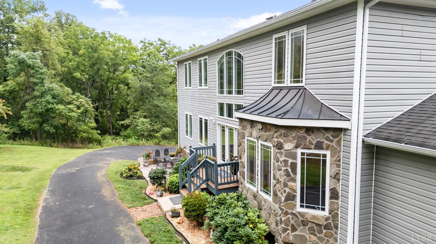 1136 Heavens View Drive Goode, VA 24556 - Photo 59 of 60 a front view of a house with garden