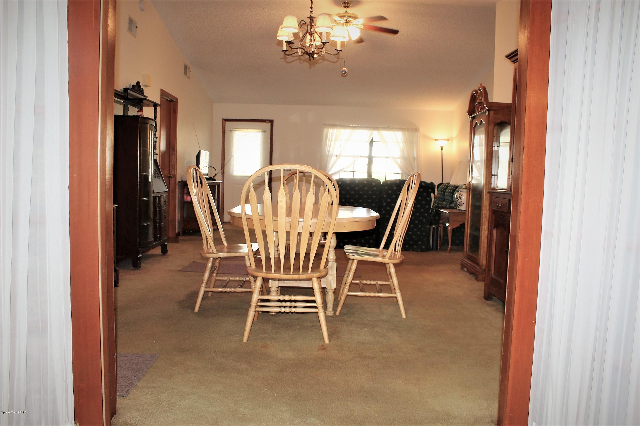 6845 Cairo Road Cocoa, FL 32927 - Photo 11 of 29 French doors to Dining