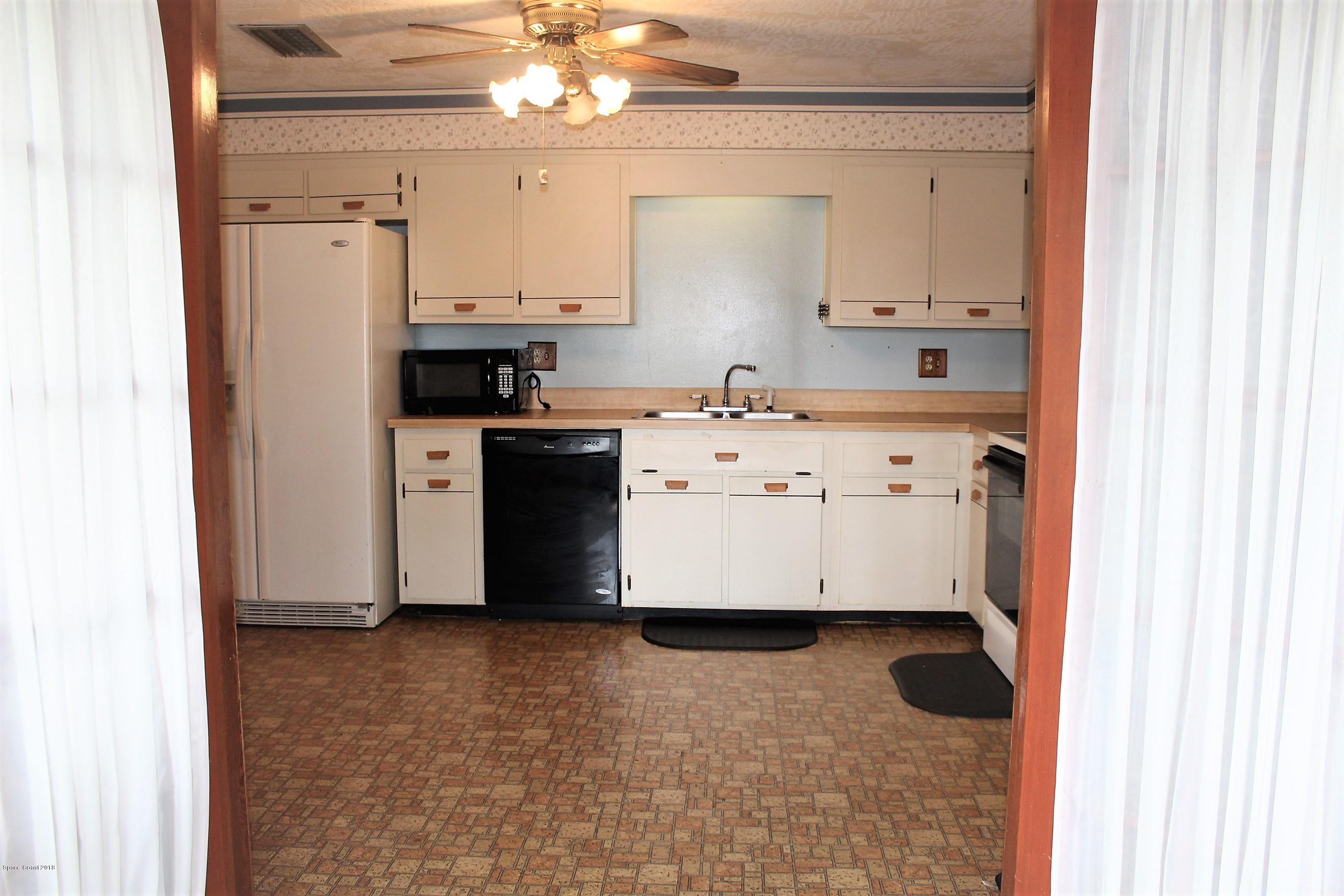 6845 Cairo Road Cocoa, FL 32927 - Photo 10 of 29 French doors to Kitchen