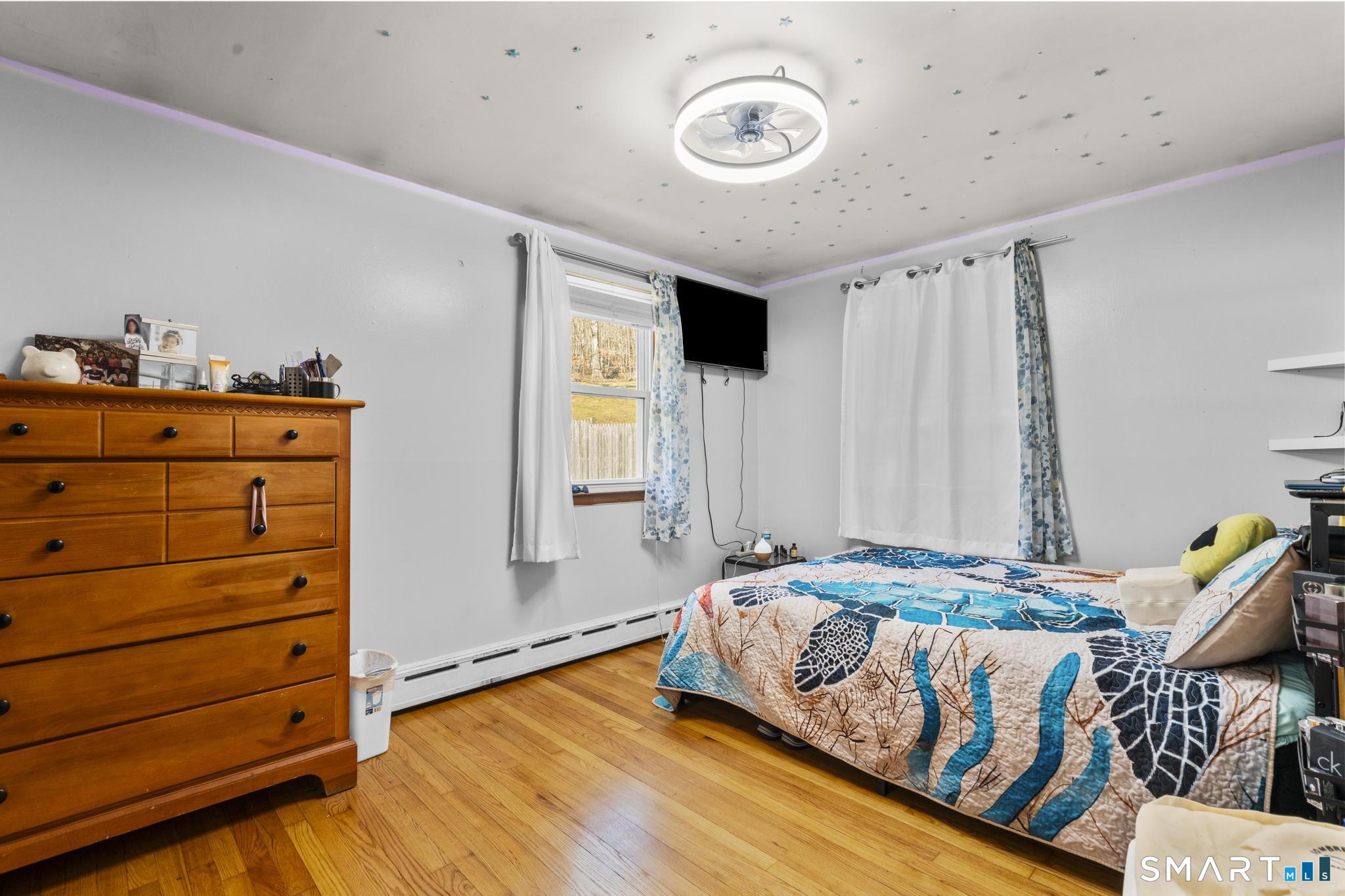 208 Bungay Road Seymour, CT 06483 - Photo 14 of 24 a bedroom with a bed and a window