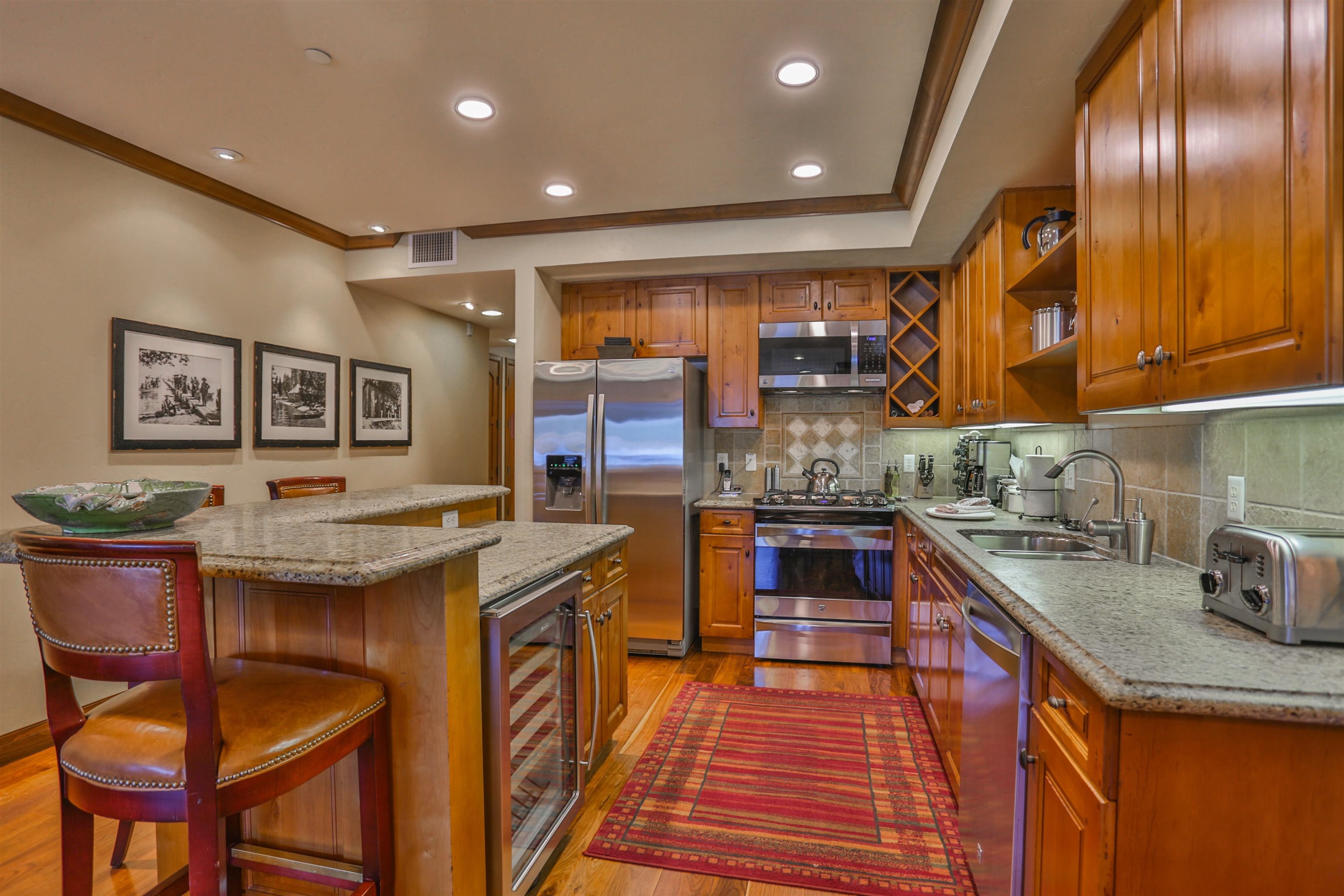 6750 North Lake Boulevard, Unit 3C Tahoe Vista, CA 96148 - Photo 12 of 22 a kitchen with granite countertop lots of counter top space