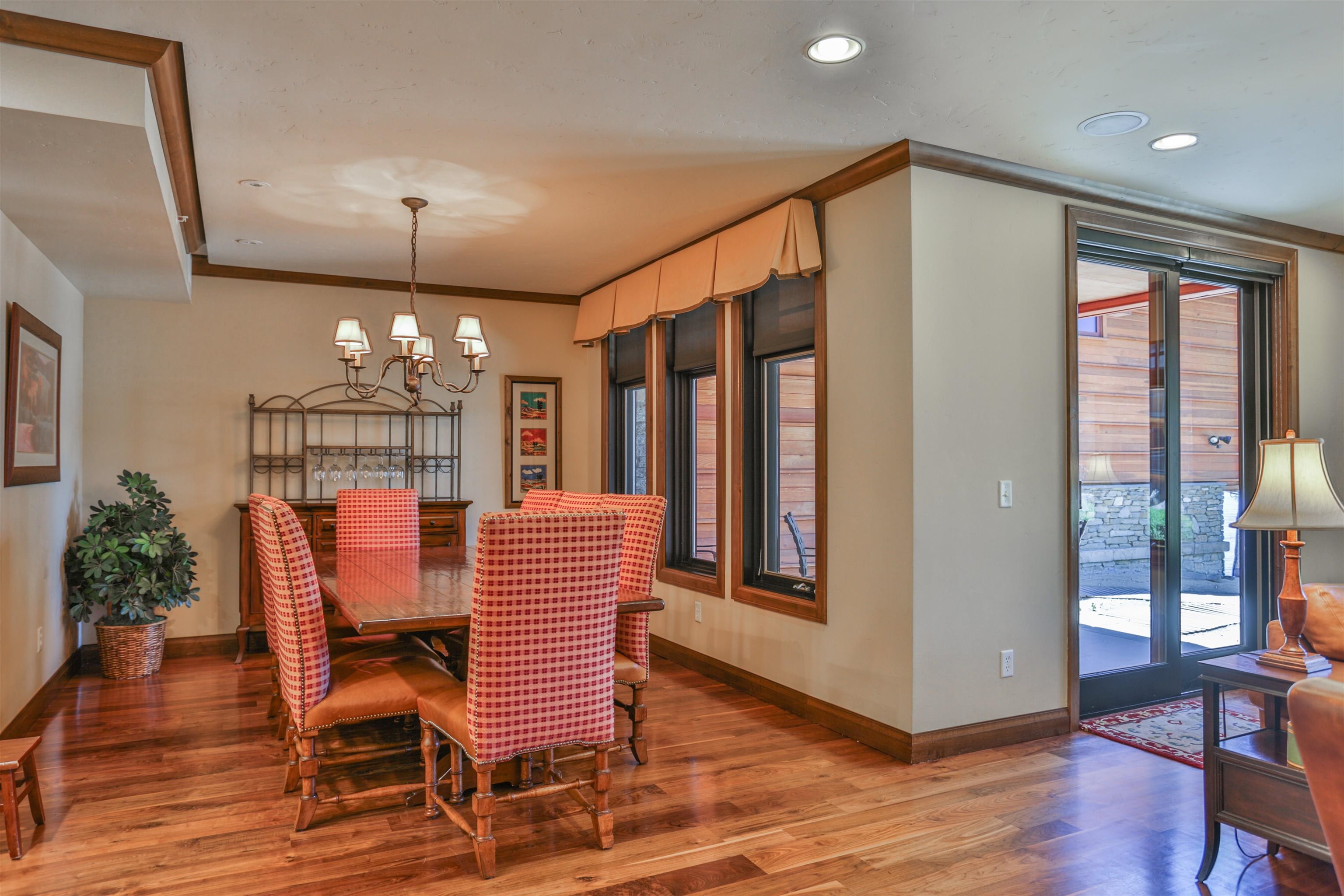 6750 North Lake Boulevard, Unit 3C Tahoe Vista, CA 96148 - Photo 14 of 22 a view of a dining room with furniture window and wooden floor