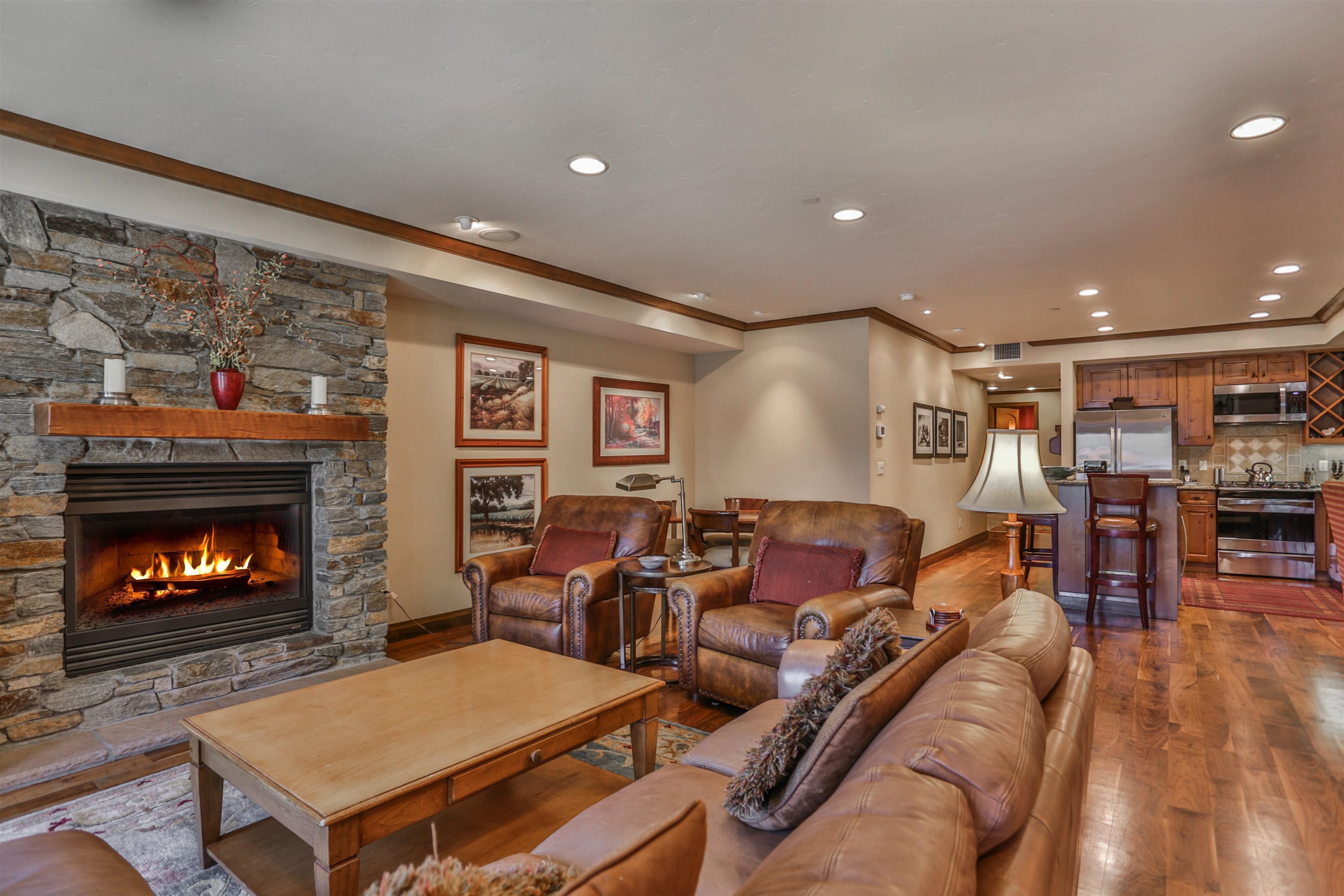 6750 North Lake Boulevard, Unit 3C Tahoe Vista, CA 96148 - Photo 17 of 22 a living room with furniture and a fireplace