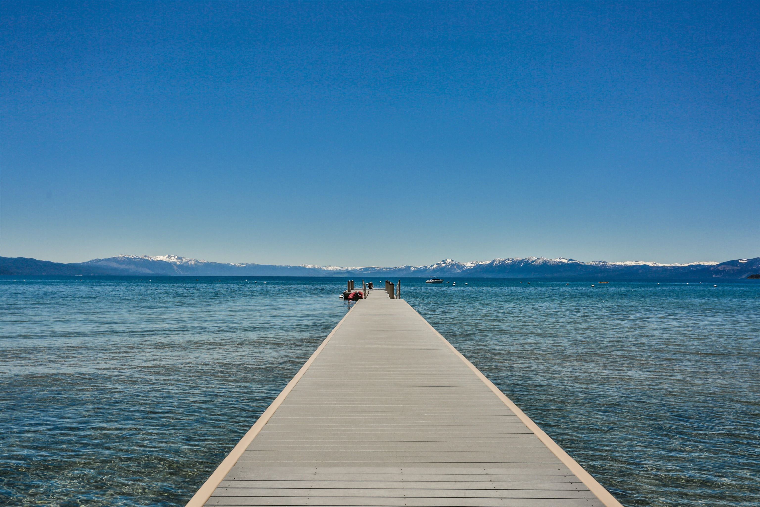 6750 North Lake Boulevard, Unit 3C Tahoe Vista, CA 96148 - Photo 22 of 22 a view of deck and lake with mountain in background