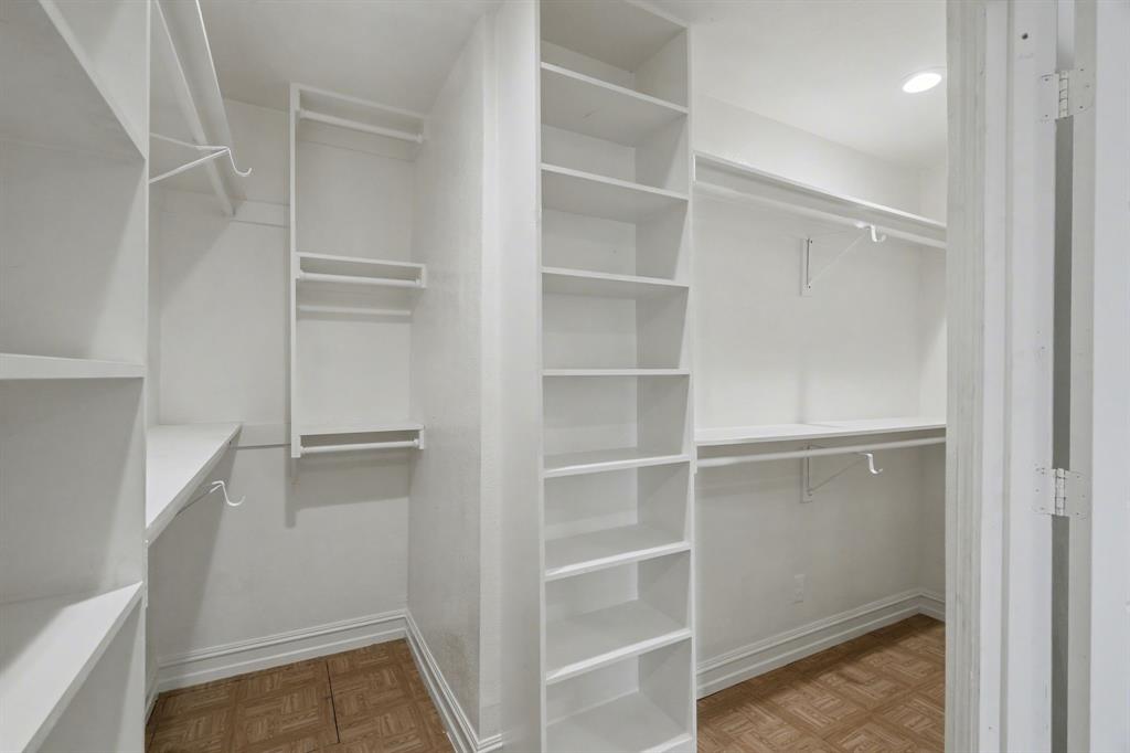1714 East Union Bower Road Irving, TX 75061 - Photo 24 of 32 a view of walk in closet with empty racks