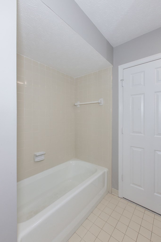 3613 Maryland Circle, Unit A Columbus, GA 31907 - Photo 12 of 28 a spacious bathroom with bathtub and shower