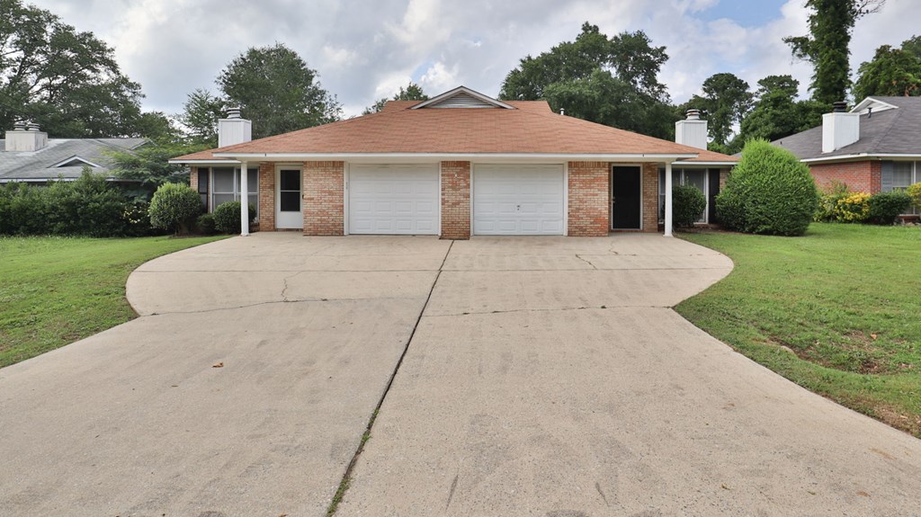 3613 Maryland Circle, Unit A Columbus, GA 31907 - Photo 2 of 28 front view of a house with a yard